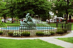 Fountain and statue in the park in the center of Wellsboro, PA.
