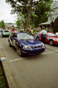 Bryan Hourt / Tom Tighe Honda Civic rolls into parc expose before the rally.