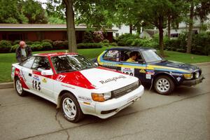 Jon Bogert / Daphne Bogert Toyota Celica All-Trac and Mike White / Marc Goldfarb SAAB 99GLI at parc expose before the rally.