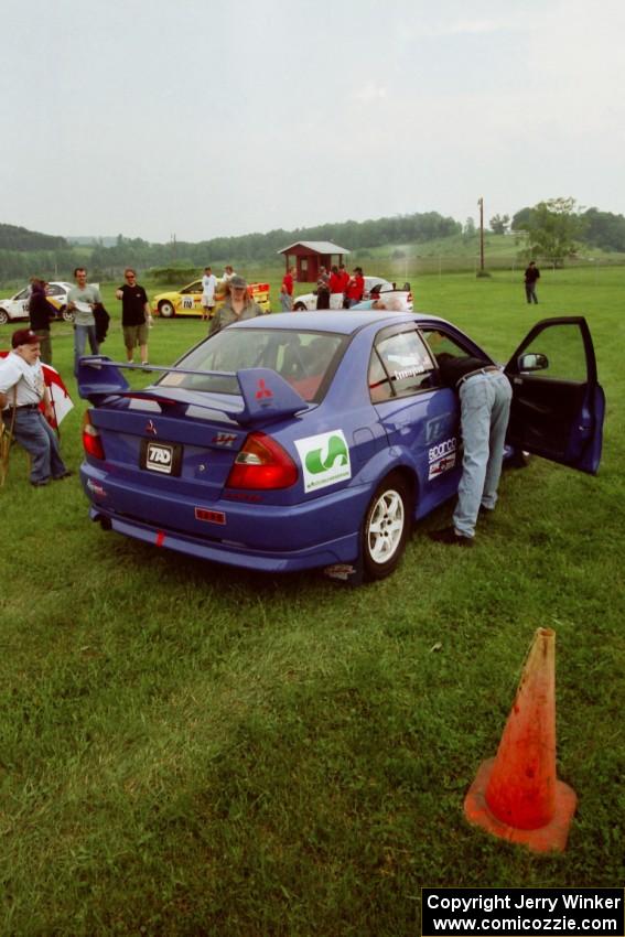 Peter Cunningham / Jim Gill Mitsubishi Lancer Evo VI in line for tech inspection.