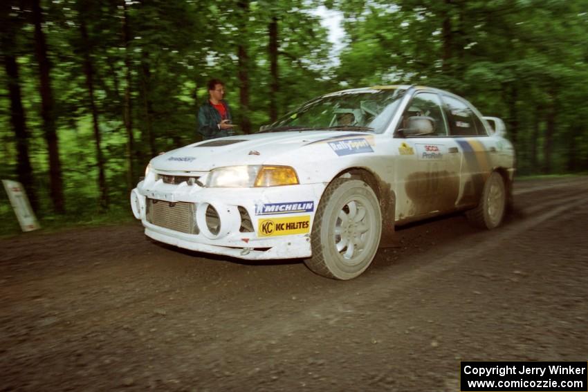 Pete Lahm / Matt Chester Mitsubishi Lancer Evo IV launches from the start of the practice stage.