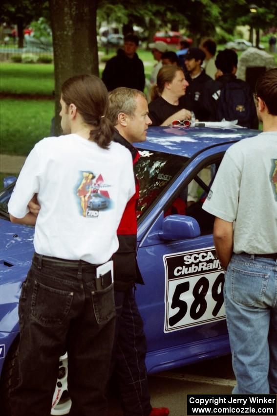 Peter Cunningham / Jim Gill Mitsubishi Lancer Evo VI at parc expose before the rally.