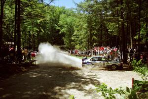 Karl Scheible / Russ Hughes Mitsubishi Lancer Evo V at the Asaph Campground spectator location on SS4, Phasa.