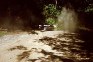 Jens Larsen / Bob Barrall Mazda RX-7 at the Asaph Campground spectator location on SS4, Phasa.