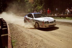 Andy Bornhop / Mark Williams Hyundai Tiburon at the Asaph Campground spectator location on SS4, Phasa.