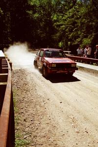 Scott Williams / Trisha Williams VW GTI at the Asaph Campground spectator location on SS4, Phasa.