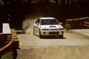 Érik Comas / Julian Masters Mitsubishi Lancer Evo IV at the Asaph Campground spectator location on SS4, Phasa.