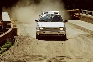 Brad Hawkins / Adrian Wintle VW GTI at the Asaph Campground spectator location on SS4, Phasa.