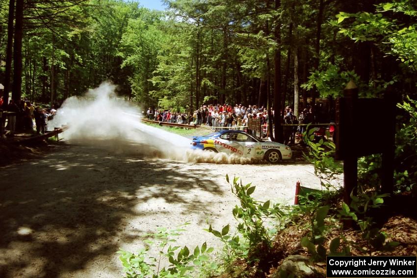 Paul Choiniere / Jeff Becker Hyundai Tiburon at the Asaph Campground spectator location on SS4, Phasa.