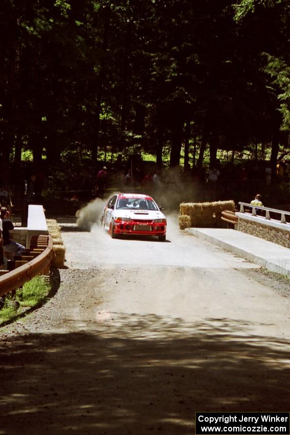 Garen Shrader / Doc Schrader Mitsubishi Lancer Evo IV at the Asaph Campground spectator location on SS4, Phasa.