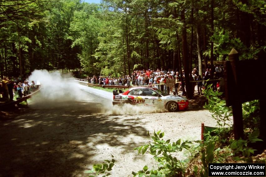 Garen Shrader / Doc Schrader Mitsubishi Lancer Evo IV at the Asaph Campground spectator location on SS4, Phasa.