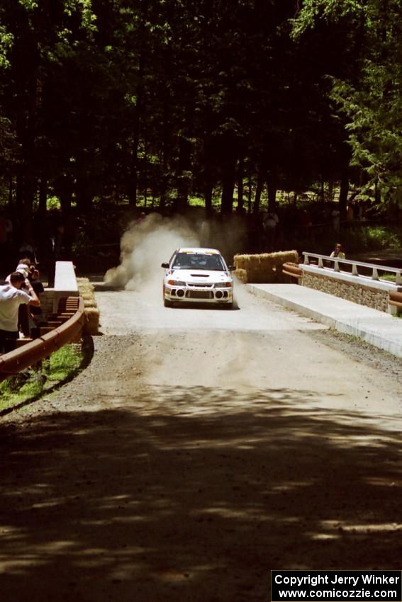 Pete Lahm / Matt Chester Mitsubishi Lancer Evo IV at the Asaph Campground spectator location on SS4, Phasa.