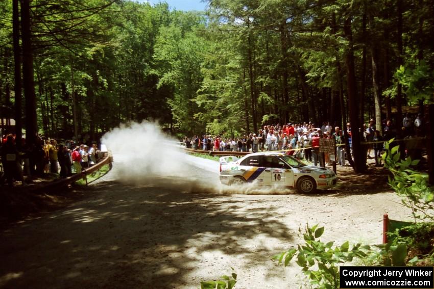 Pete Lahm / Matt Chester Mitsubishi Lancer Evo IV at the Asaph Campground spectator location on SS4, Phasa.