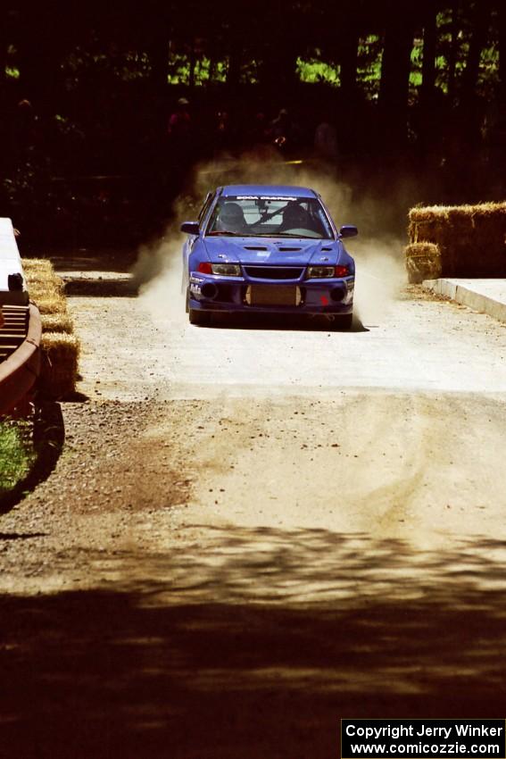 Peter Cunningham / Jim Gill Mitsubishi Lancer Evo VI at the Asaph Campground spectator location on SS4, Phasa.