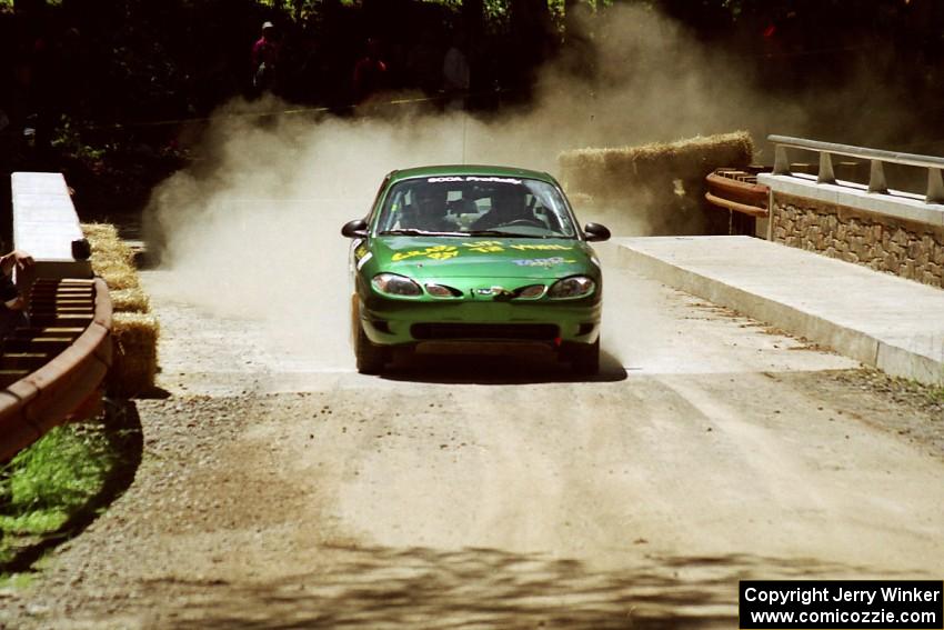 Tad Ohtake / Bob Martin Ford Escort ZX2 at the Asaph Campground spectator location on SS4, Phasa.