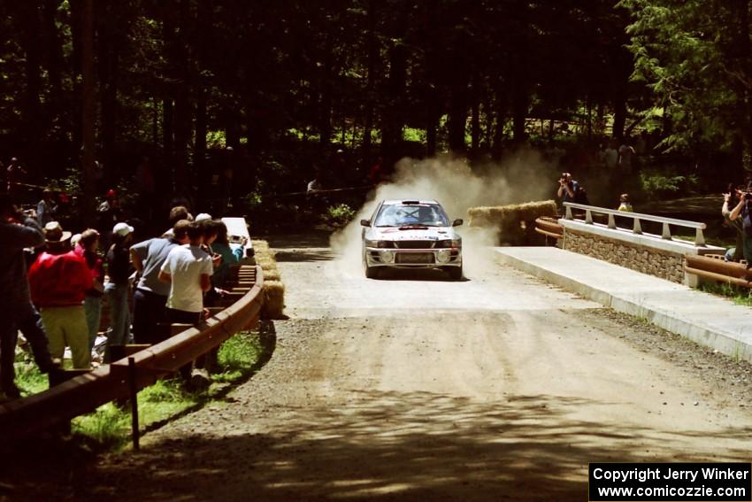 Sakis Hadjiminas / Brian Maxwell Subaru Impreza Turbo at the Asaph Campground spectator location on SS4, Phasa.