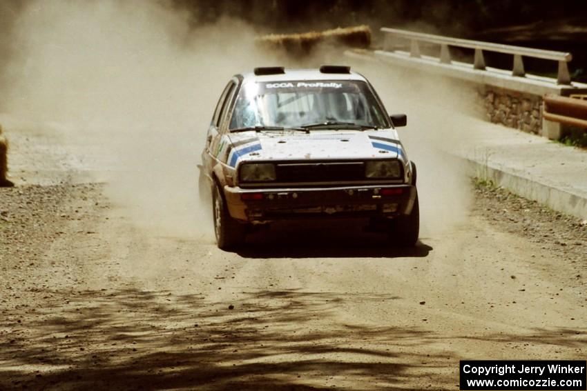 Eric Burmeister / Mark Buskirk VW GTI at the Asaph Campground spectator location on SS4, Phasa.