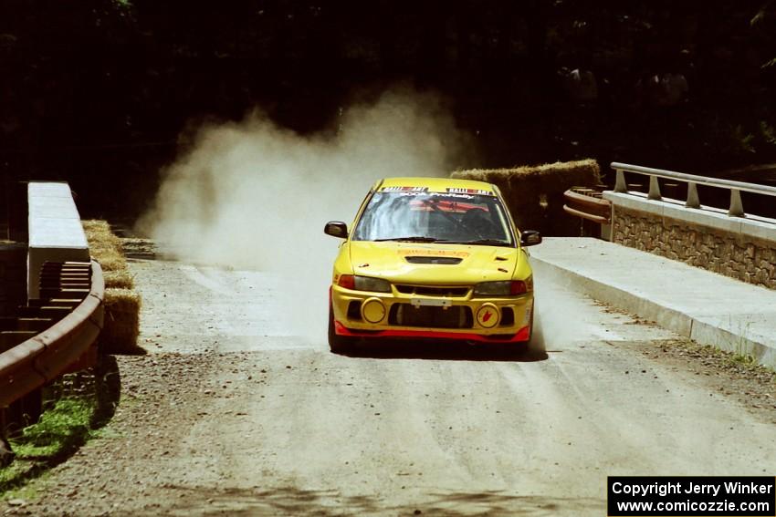 Mark Nelson / John Dillon Mitsubishi Lancer Evo IV at the Asaph Campground spectator location on SS4, Phasa.