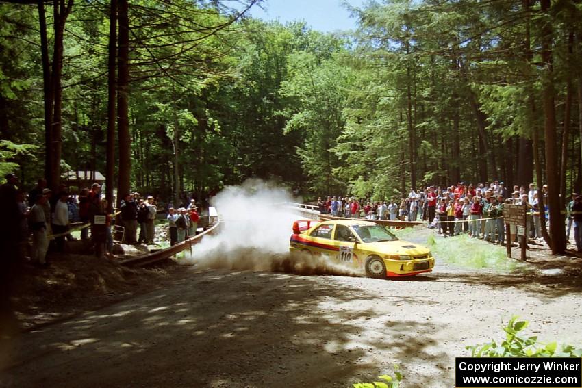 Mark Nelson / John Dillon Mitsubishi Lancer Evo IV at the Asaph Campground spectator location on SS4, Phasa.