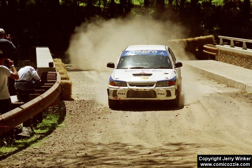 Vinnie Frontinan / Nick Pessoa Mitsubishi Lancer Evo IV at the Asaph Campground spectator location on SS4, Phasa.