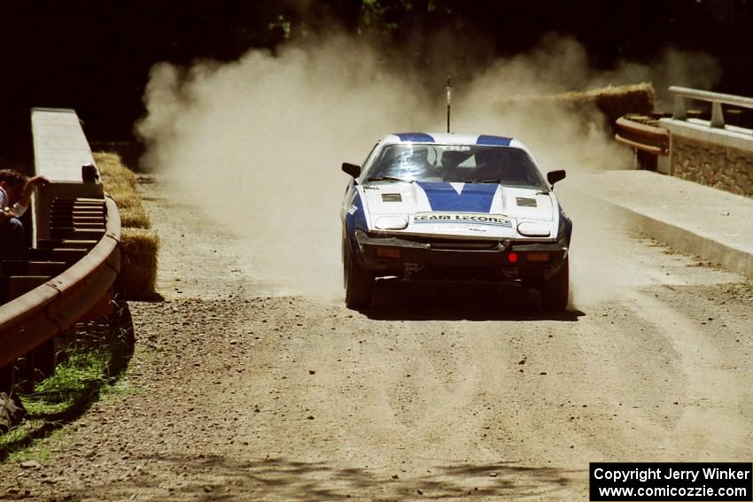 John Shirley / Rob Hughes Triumph TR-7 at the Asaph Campground spectator location on SS4, Phasa.