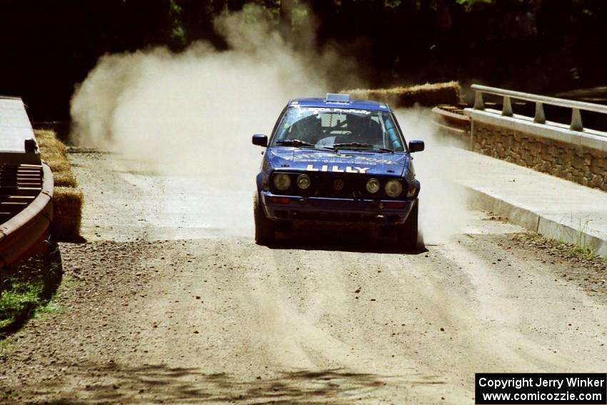 Patrick Lilly / Mark McAllister VW GTI at the Asaph Campground spectator location on SS4, Phasa.