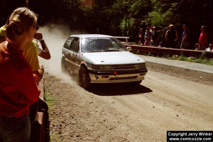 Niall Donnelly / Tony Lumino Mitsubishi Mirage at the Asaph Campground spectator location on SS4, Phasa.