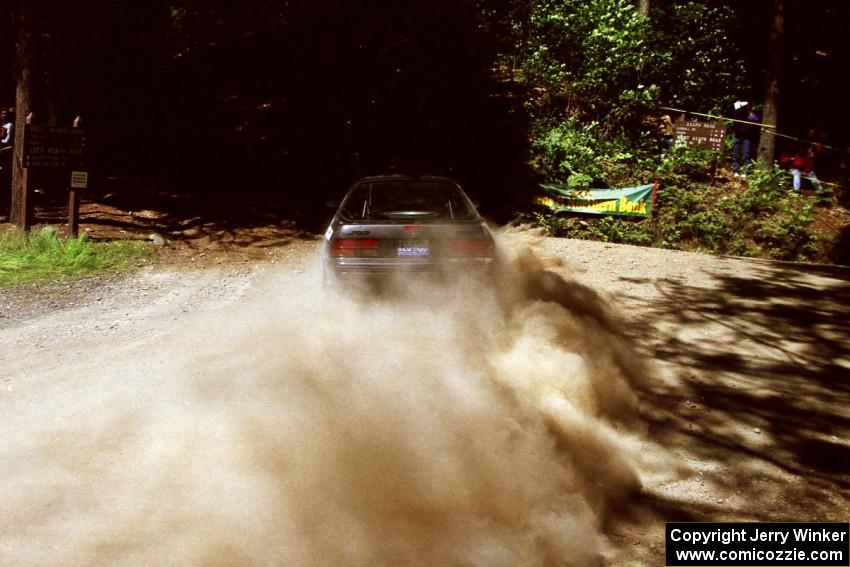 Jens Larsen / Bob Barrall Mazda RX-7 at the Asaph Campground spectator location on SS4, Phasa.