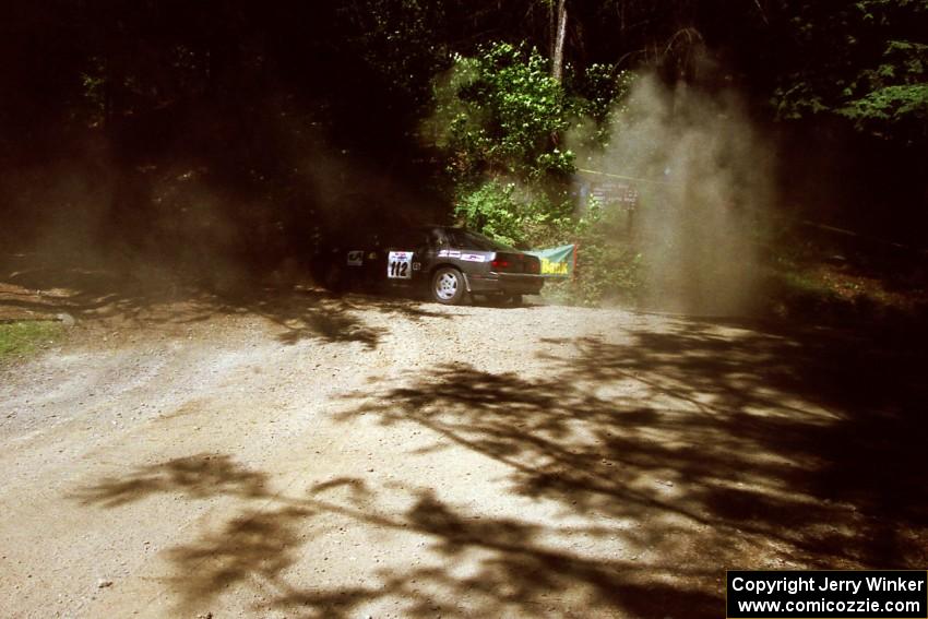 Jens Larsen / Bob Barrall Mazda RX-7 at the Asaph Campground spectator location on SS4, Phasa.