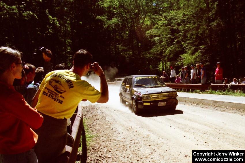 Declan Hegarty / Kevin Mullan VW GTI at the Asaph Campground spectator location on SS4, Phasa.