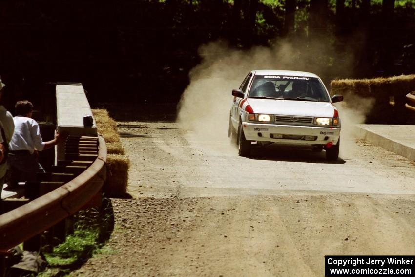 Ted Mendham / Lise Mendham Nissan Sentra SE-R at the Asaph Campground spectator location on SS4, Phasa.