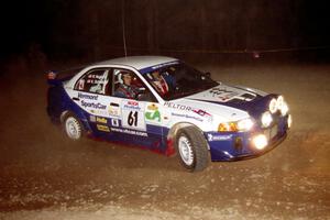 Karl Scheible / Russ Hughes Mitsubishi Lancer Evo V at the first hairpin on SS8, Rim Stock.