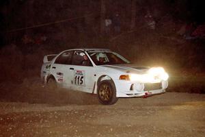 Seamus Burke / Frank Cunningham Mitsubishi Lancer Evo IV at the first hairpin on SS8, Rim Stock.