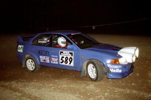 Peter Cunningham / Jim Gill Mitsubishi Lancer Evo VI at the first hairpin on SS8, Rim Stock.