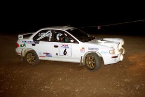 Henry Krolikowski / Cindy Krolikowski Subaru WRX STi at the first hairpin on SS8, Rim Stock.