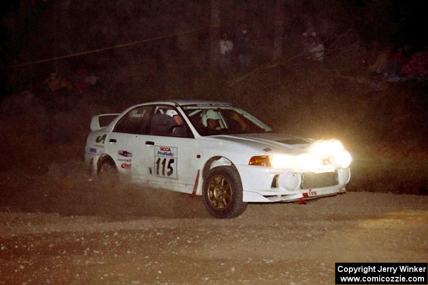 Seamus Burke / Frank Cunningham Mitsubishi Lancer Evo IV at the first hairpin on SS8, Rim Stock.