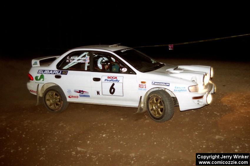 Henry Krolikowski / Cindy Krolikowski Subaru WRX STi at the first hairpin on SS8, Rim Stock.