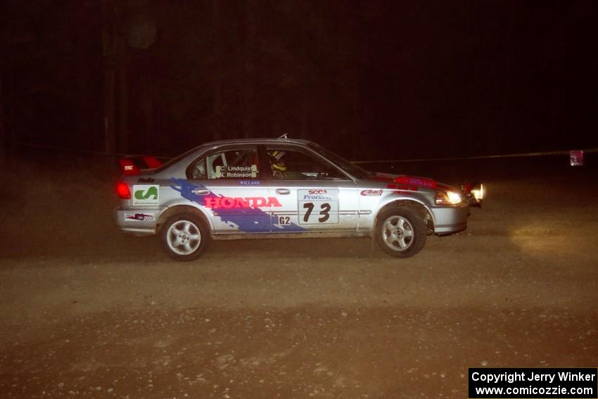 Nick Robinson / Carl Lindquist Honda Civic at the first hairpin on SS8, Rim Stock.