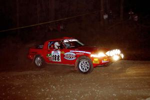 Andrew Havas / Scott Slingerland Mazda RX-7 at the first hairpin on SS8, Rim Stock.