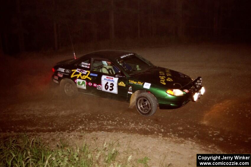 Tad Ohtake / Bob Martin Ford Escort ZX2 at the first hairpin on SS8, Rim Stock.