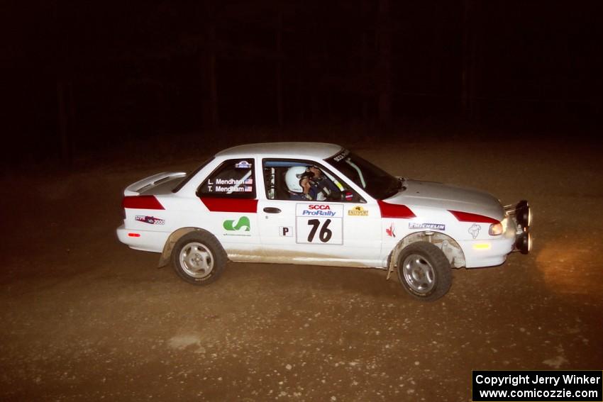 Ted Mendham / Lise Mendham Nissan Sentra SE-R at the first hairpin on SS8, Rim Stock.