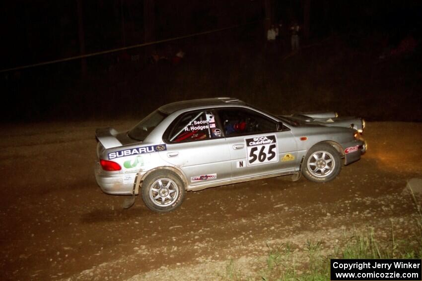 Russ Hodges / Jeff Secor Subaru WRX at the first hairpin on SS8, Rim Stock.