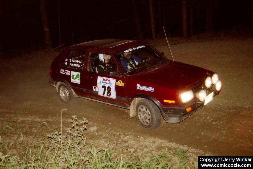 Scott Naturale / Patrick Munhall VW GTI at the first hairpin on SS8, Rim Stock.
