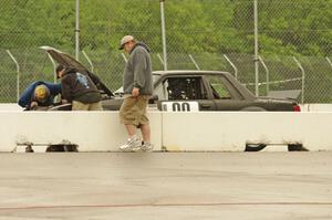 Wells Mafia Ford Mustang in the pits for a lengthy stop.