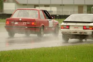 Probs Racing BMW 325 passes the Team Fugu Porsche 924