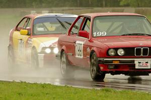 Cheap Shot Racing BMW 325is followed by Tubby Butterman Racing 1 BMW 325