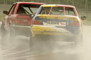 Cheap Shot Racing BMW 325is followed by Tubby Butterman Racing 1 BMW 325