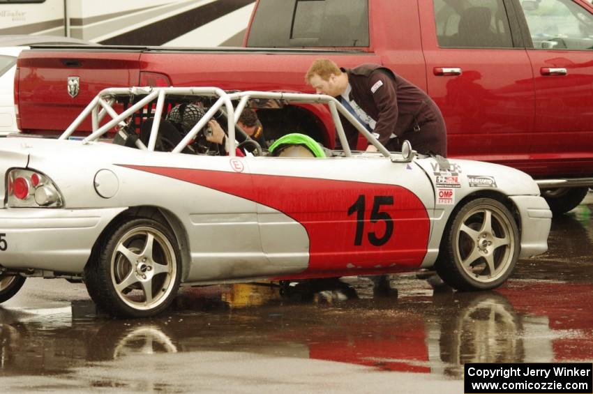 NNM Motorsports Dodge Neon in the paddock receiving work mid-race.