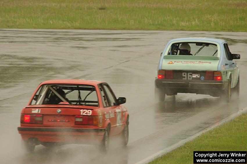 E30 Bombers BMW 325i follows the Fart-hinder SAAB 900 into turn 12.