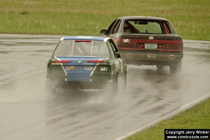 Dirty Thirty Motorsports BMW 325i chases the Eggboy Racing Ford Taurus SHO